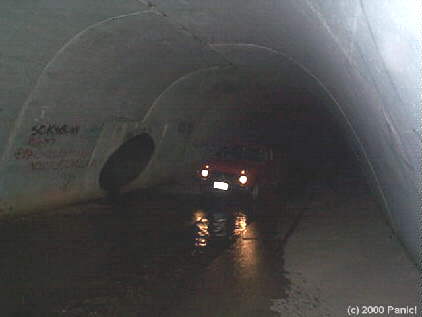 Car lighting up tunnel